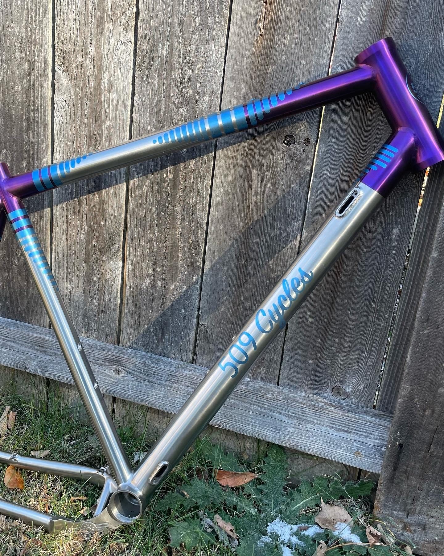 509 Cycles titanium frame with a purple and blue anodized fade